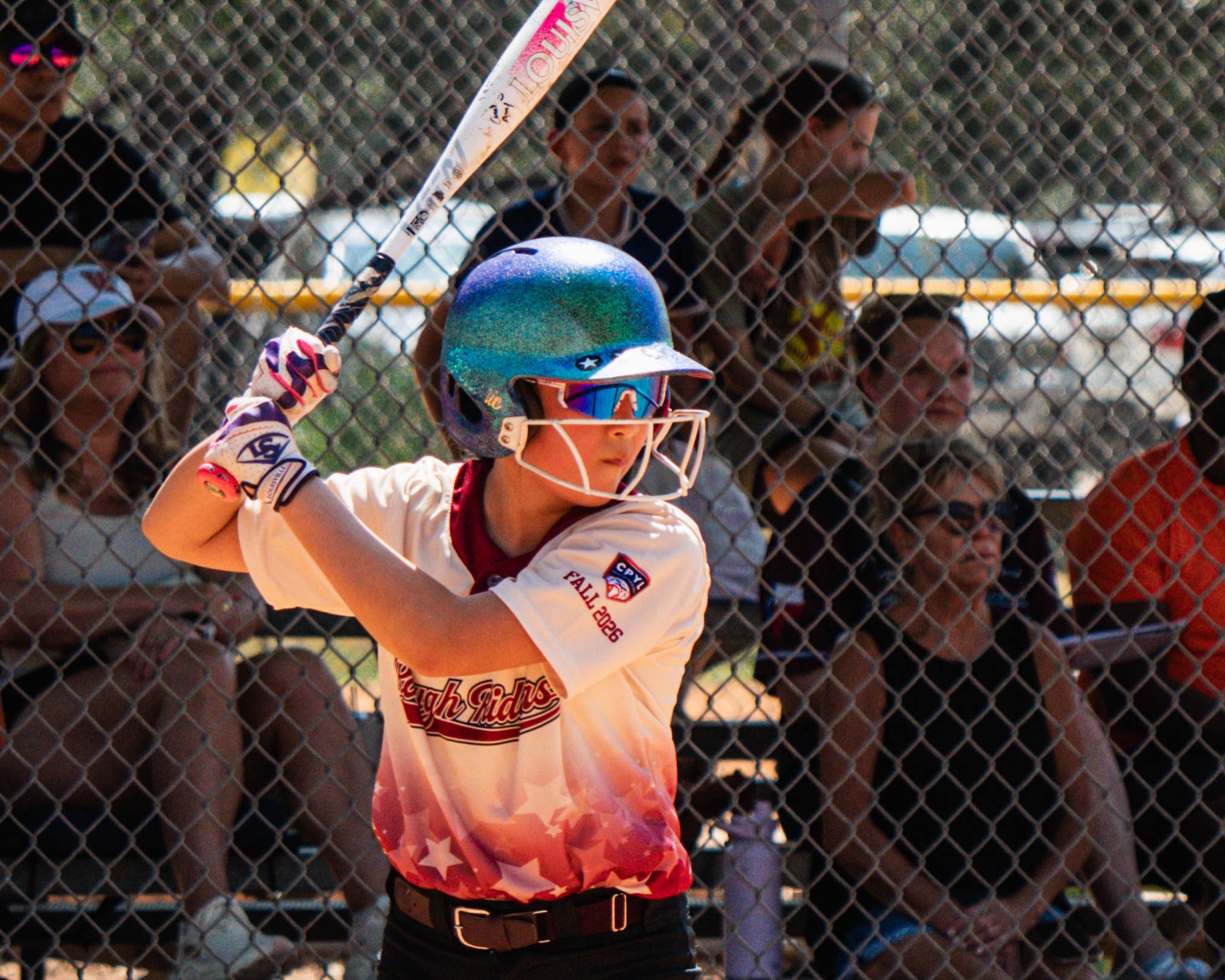Rough Rider Youth softball player ready to bat